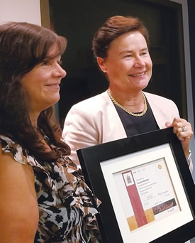 Presentation of Long Service Award to Suzanne Burbidge with Hilary McCormack